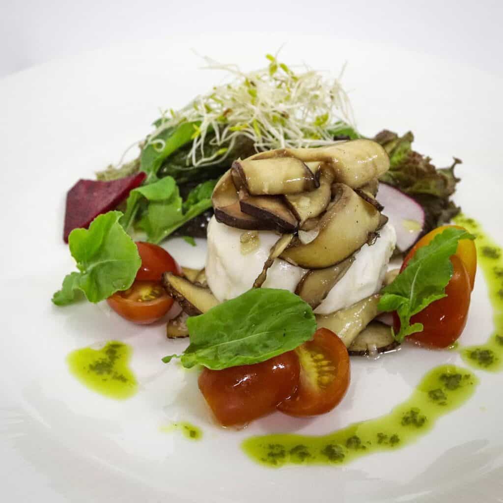 Warm Burrata Salad under Salads menu