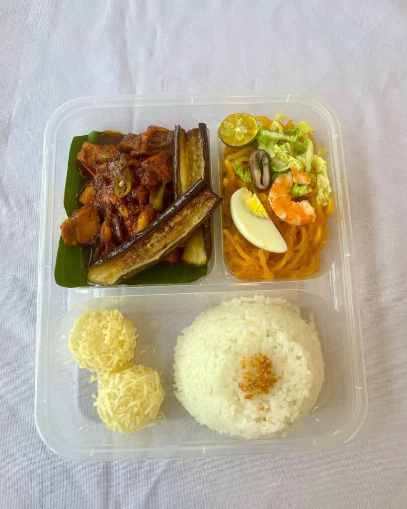 Binagoongang Baboy with complete set of rice, pancit malabon, and pitchi