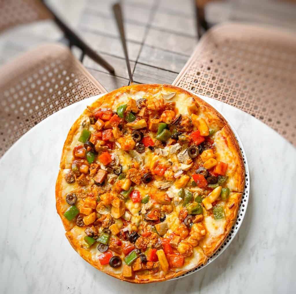 Seafood lover would love to taste this dish from Cafe Guilt's Seafood Pizza