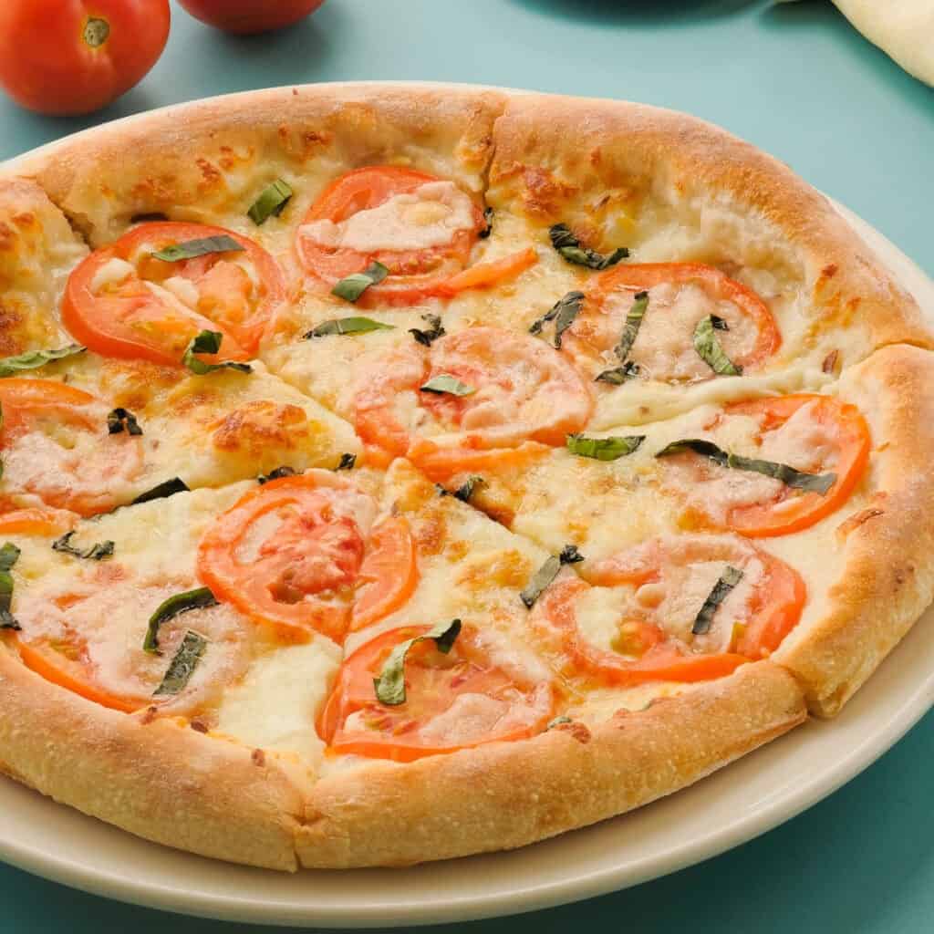 Try this 5 Cheese + Fresh Tomato pizza