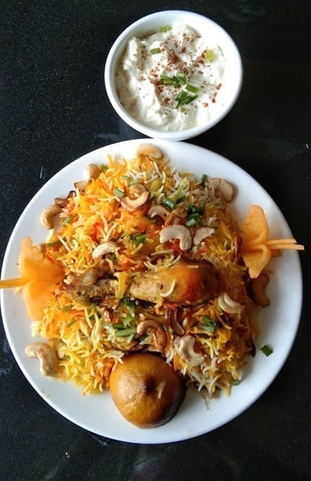 Authentic indian Chicken Biryani dish available in New Bombay menu