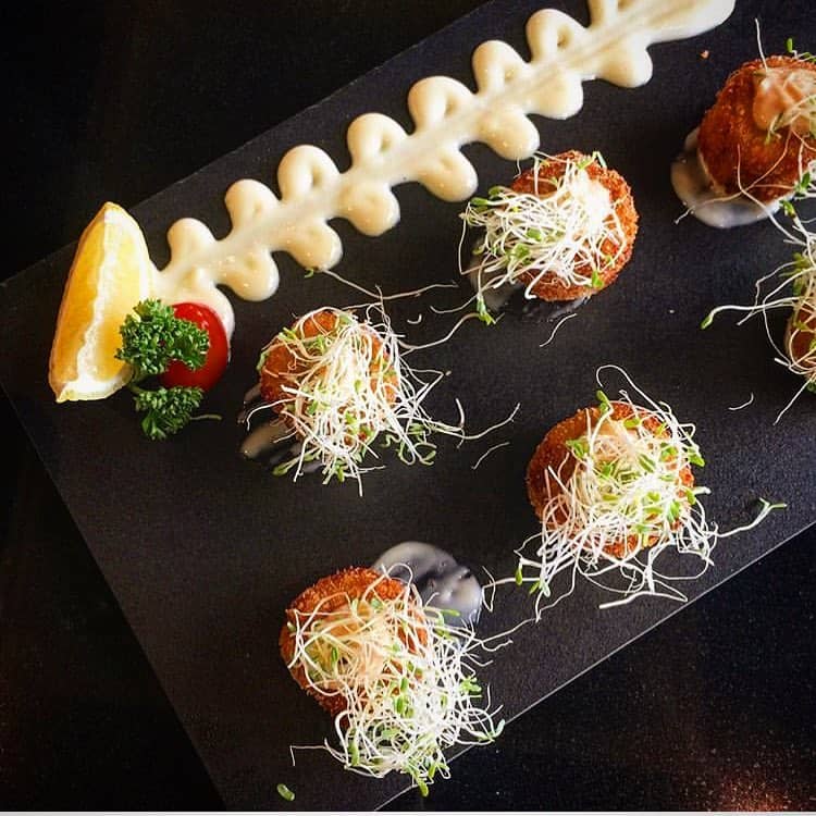 A best-selling appetizer at The Penthouse, their Golden Crab Cakes.