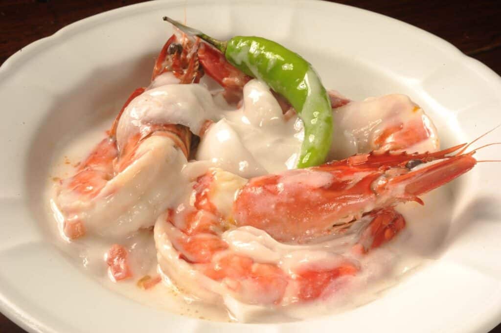 prawns cooked in coconut milk dish menu served at Abe Restaurant