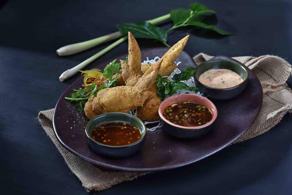 A best seller menu dish at Benjarong Manila is the Peek Gai Yad Sai Larb Gai Tord