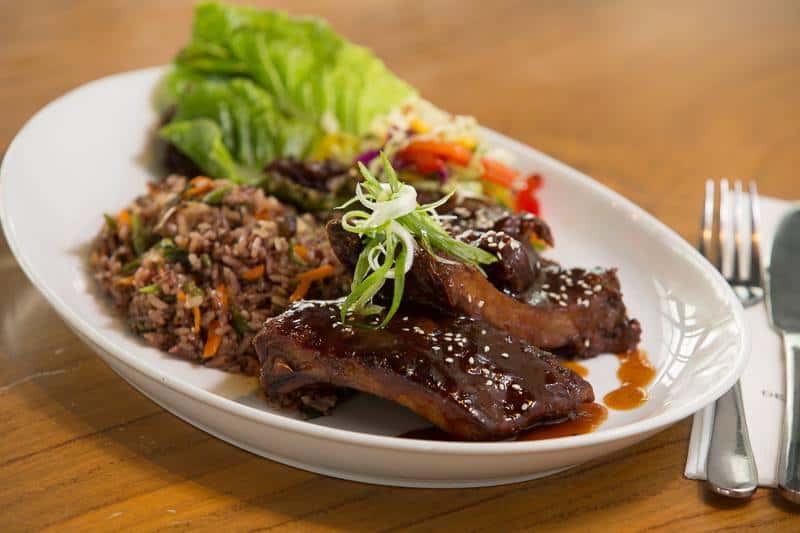 Baby back ribs served with Himalayan red rice