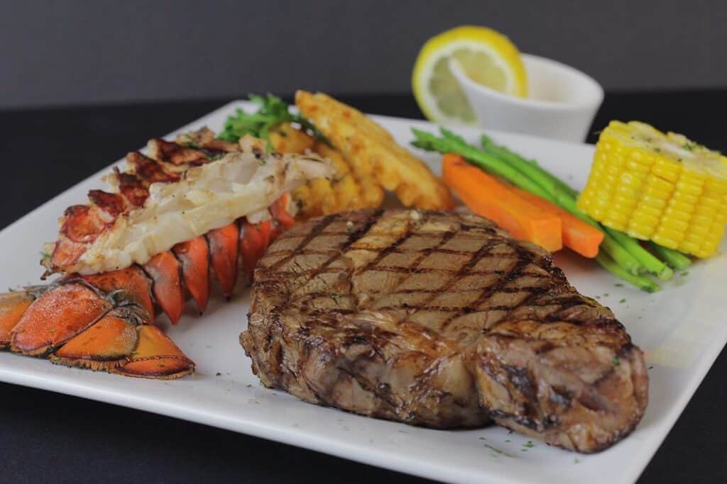 Ribeye and Grilled Lobster under Surf and Turf of Melo's Steakhouse menu