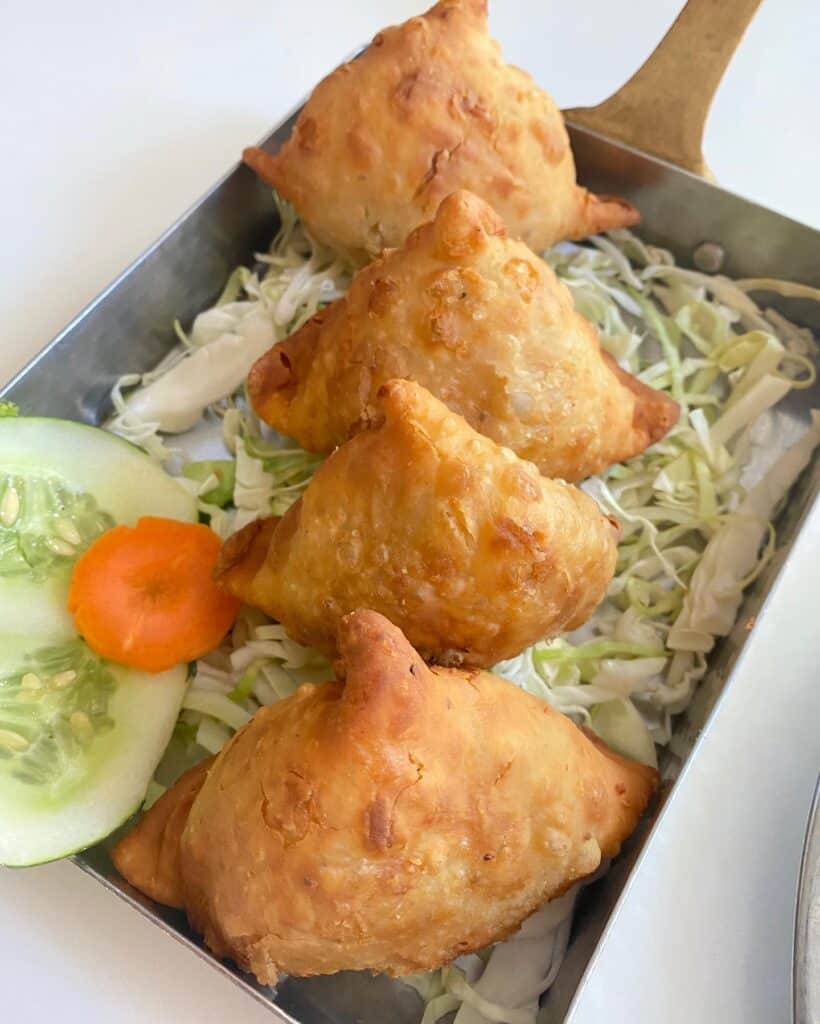 A popular appetizer in RICH is the Samosa