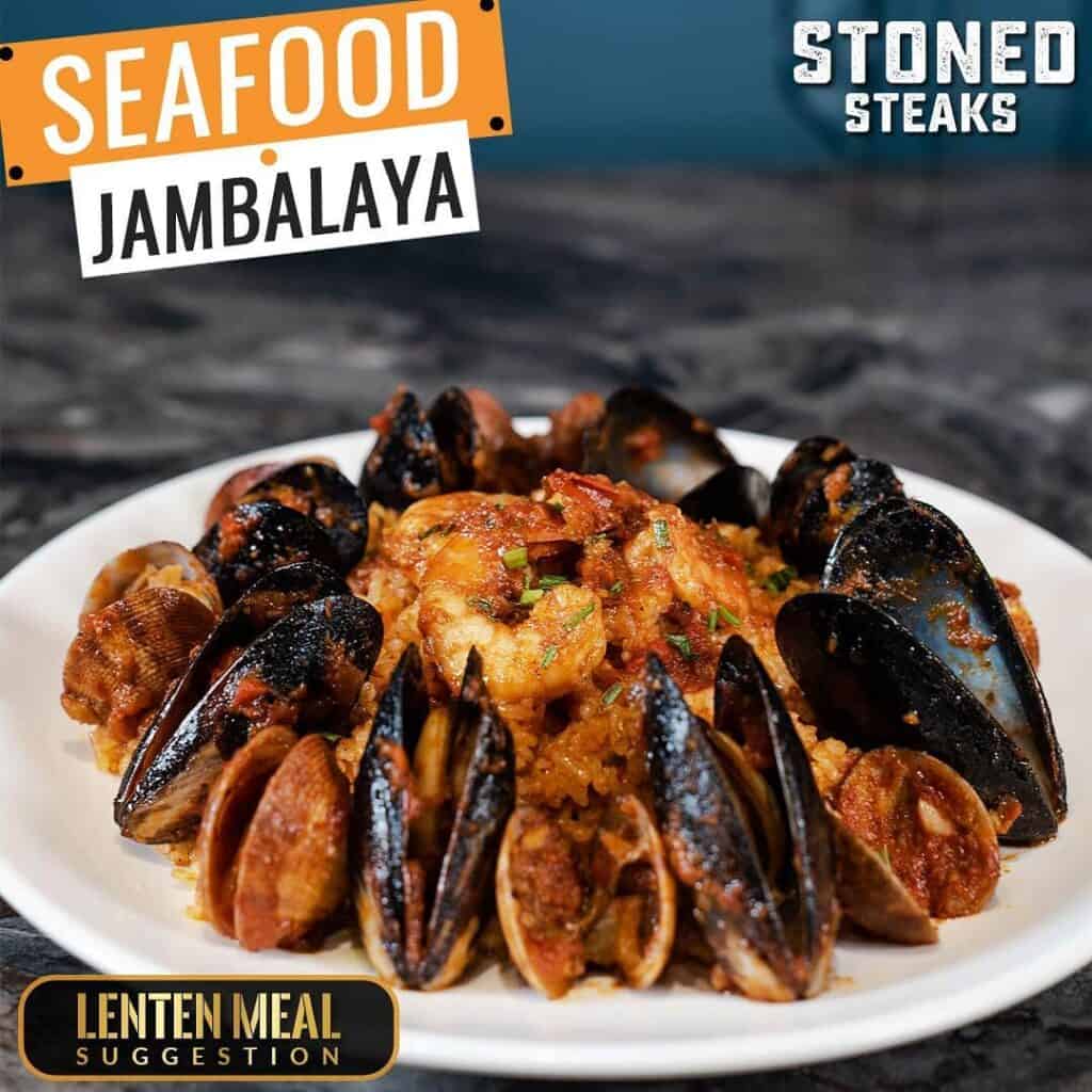 Seafood Jambalaya consists of rice, mussels, shrimps, and clams sauteed in  jambalaya sauce.