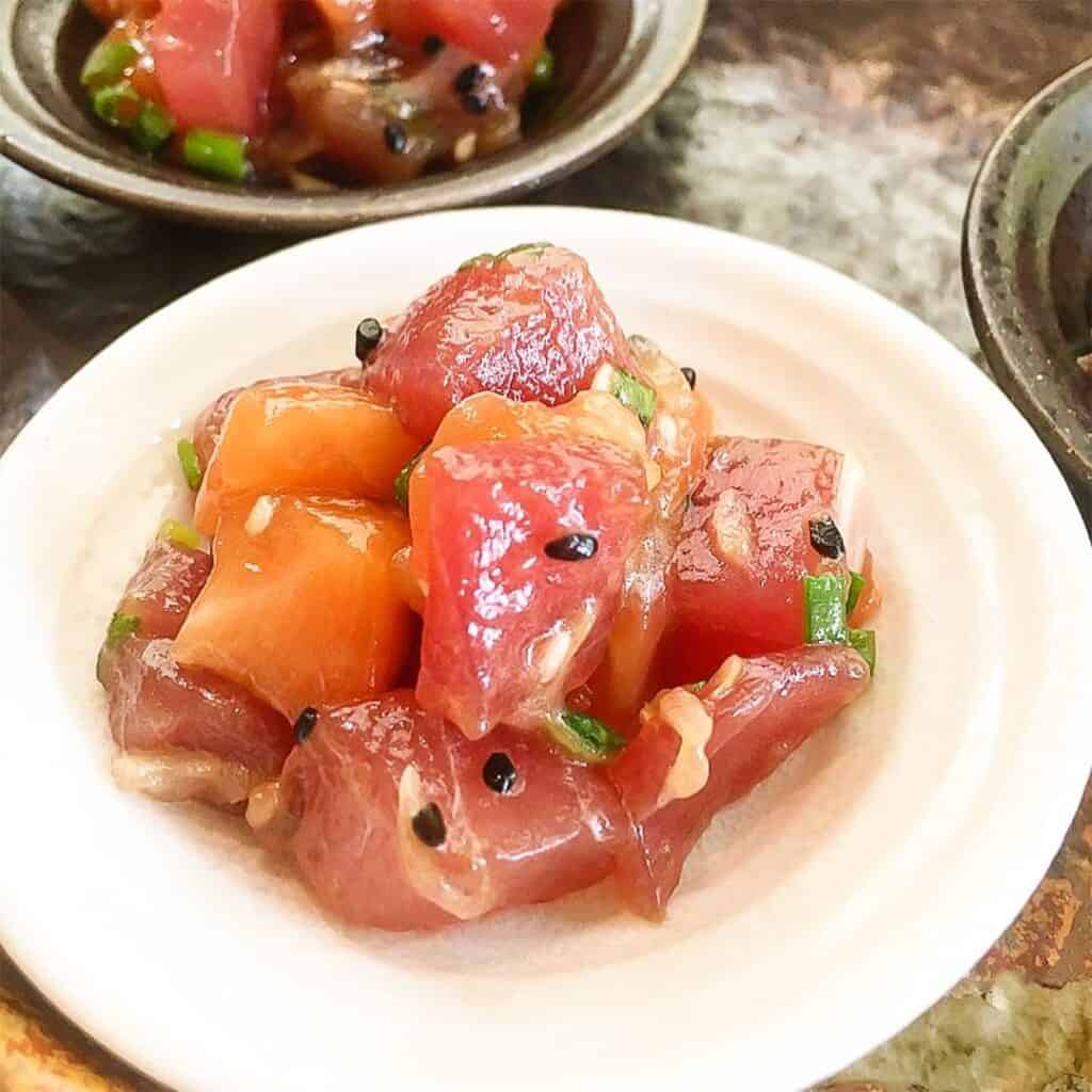 Tuna and Salmon soked in vinegar is what you called Mixed Poke dish menu available in Sushi Ninja