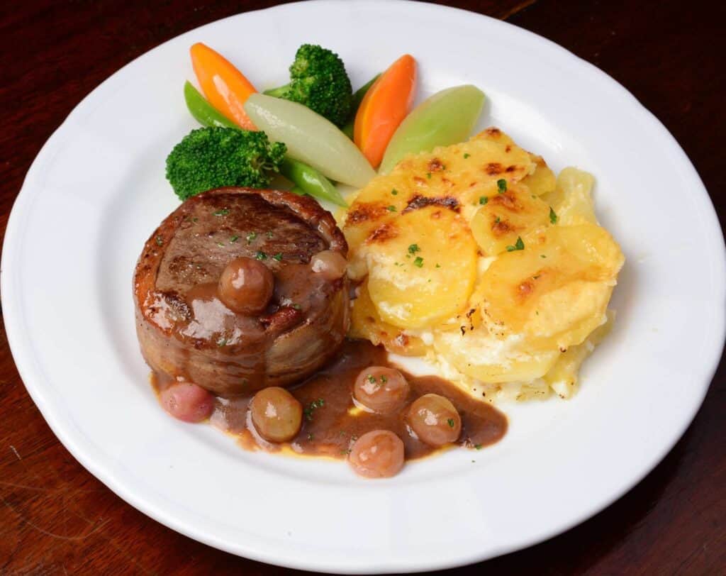 Tenderloin steak with grapes