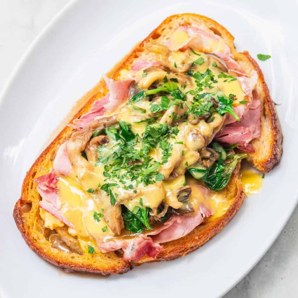 Ham, mushrooms, and eggs on toast