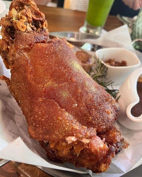 Crispy whole pork knuckle confit