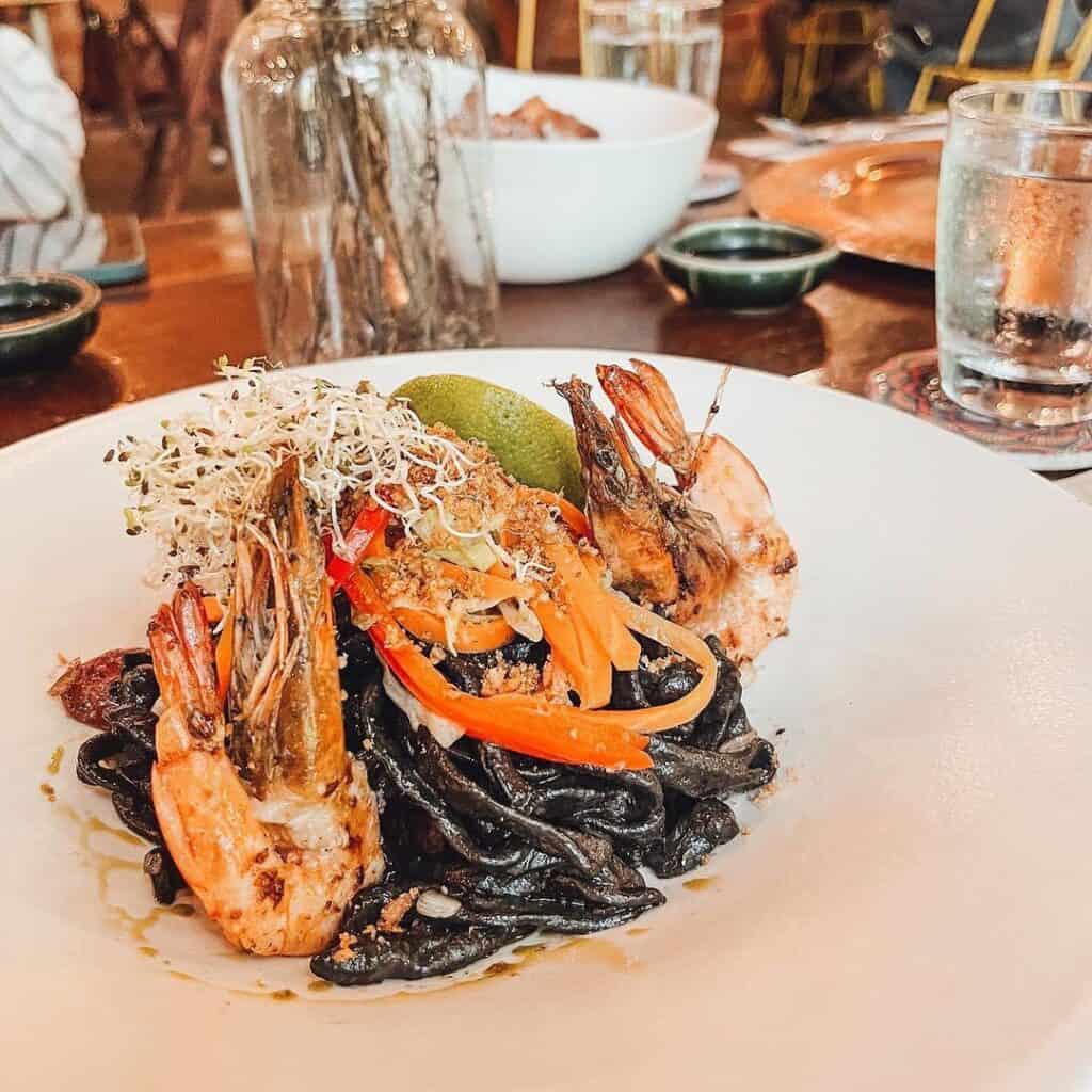 Black pancit, freshwater shrimp, tinapa flakes