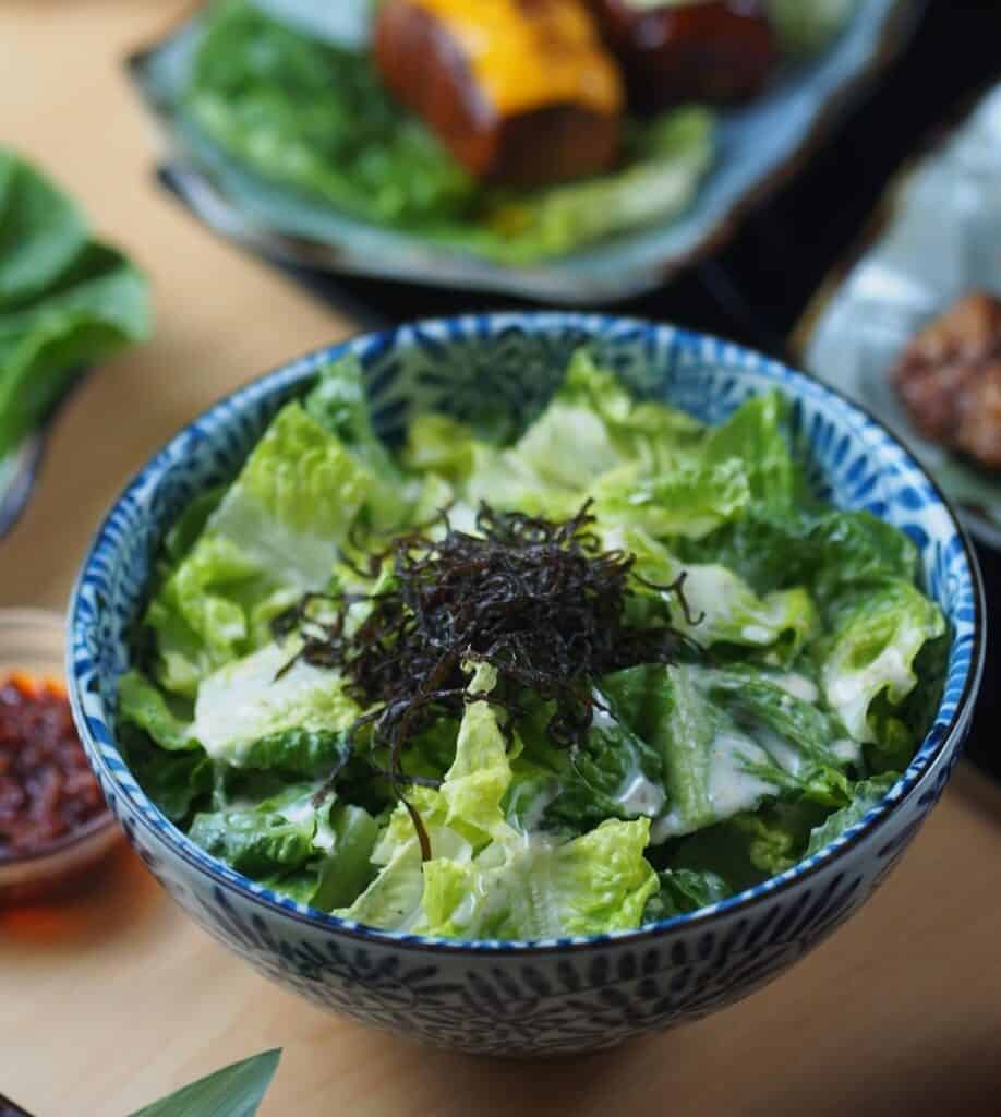 romaine lettuce caesar salad with shio-konbu